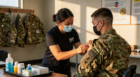 Pentagon restores mandatory flu shots for all recruits as boot camp outbreak sickens nearly 300